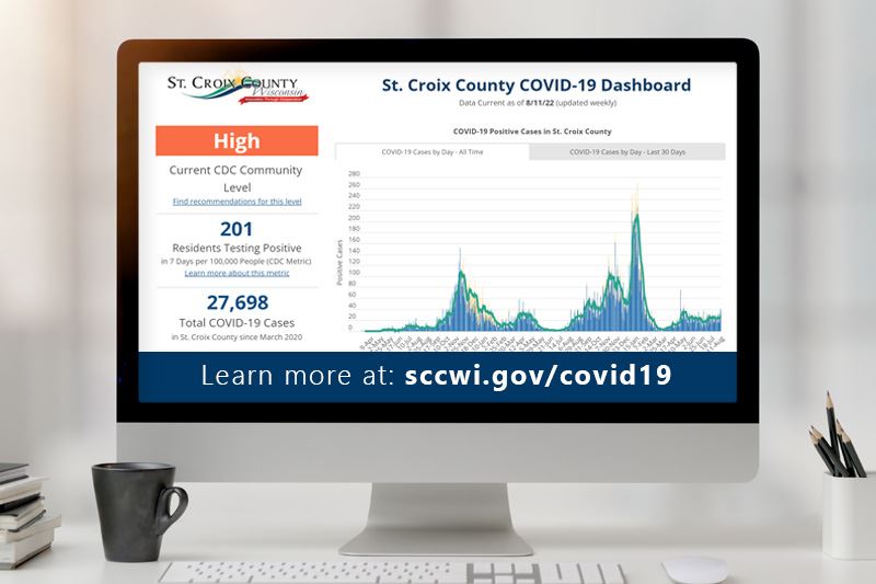 A computer showing the St. Croix County COVID-19 Data Dashboard. 
