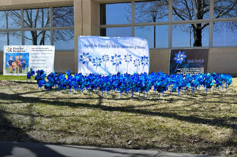 banners and pinwheels set up for family strengthening month