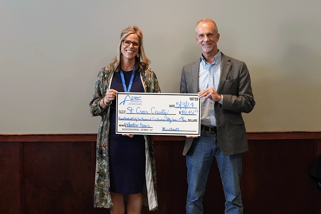 A check for over $440,000 to represent the savings created by the ADRC volunteers.